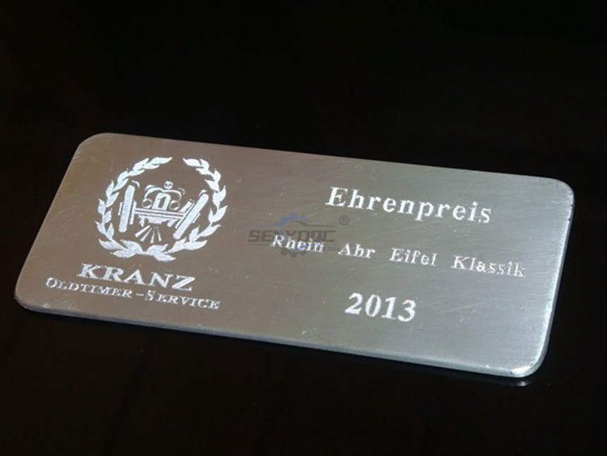 Engraving Copper and brass of signs, nameplates and name tags